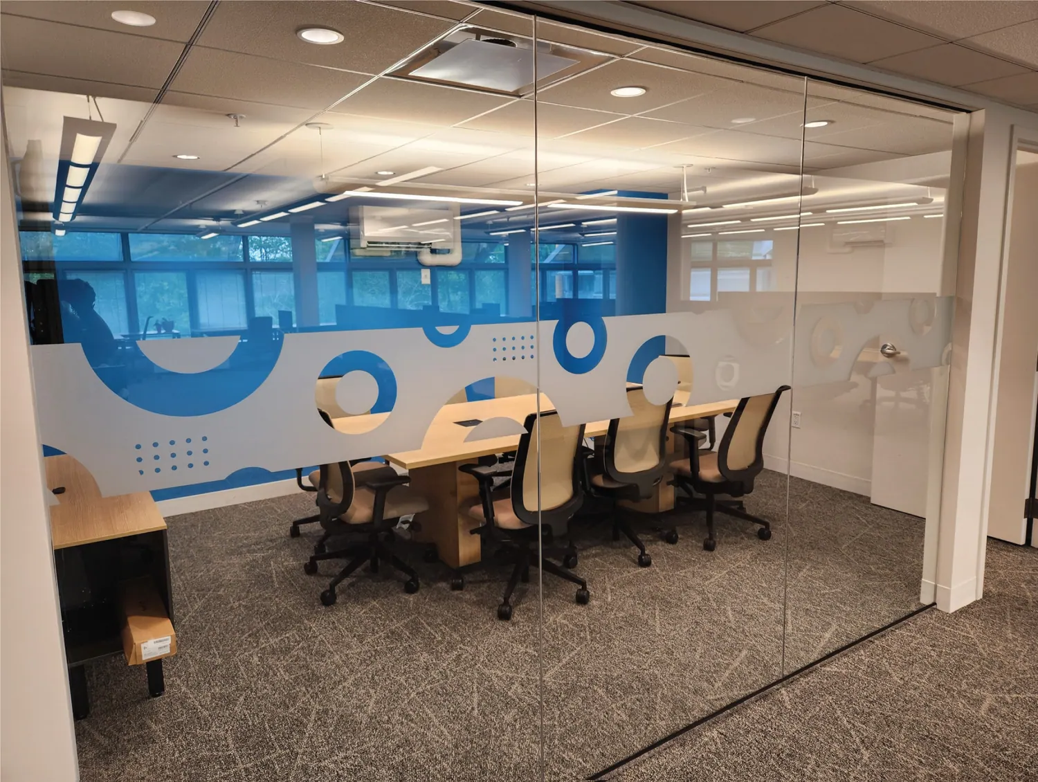 Window graphics installed on an office conference room